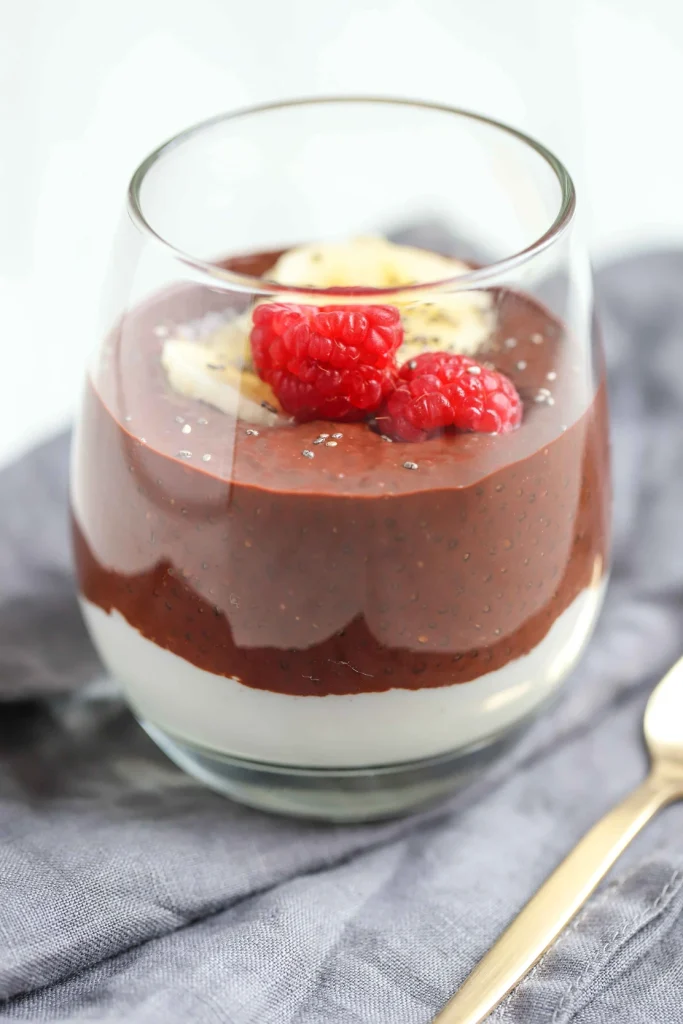 A gluten free, dairy free and refined sugar free chocolate chi pot on a grey table cloth